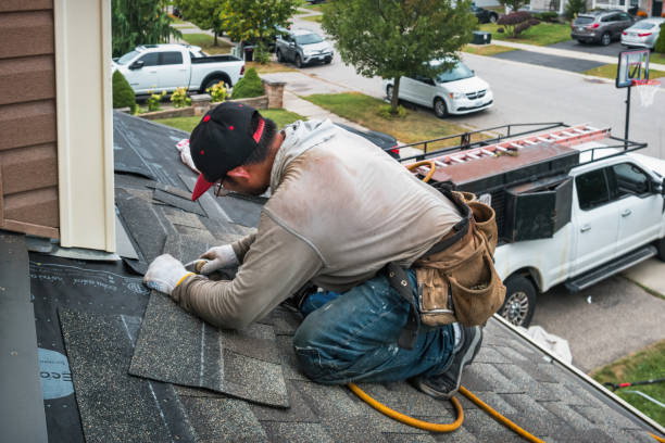 Professional Flat Roof Repair technician working in Cambridge, MA
